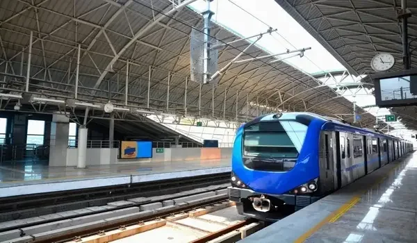 Metro train waiting at a station platform, illustrating metro connectivity