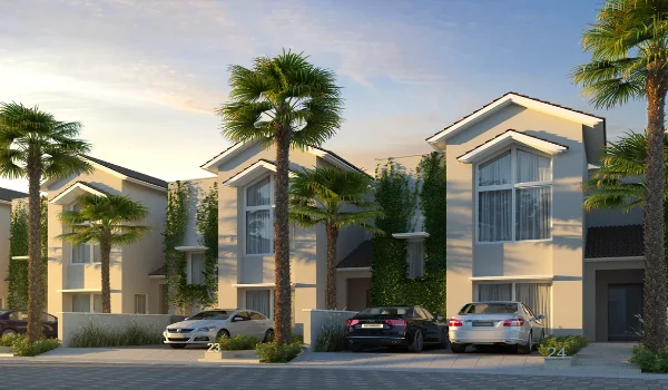 Row of modern villas with private car parking and palm-lined driveways