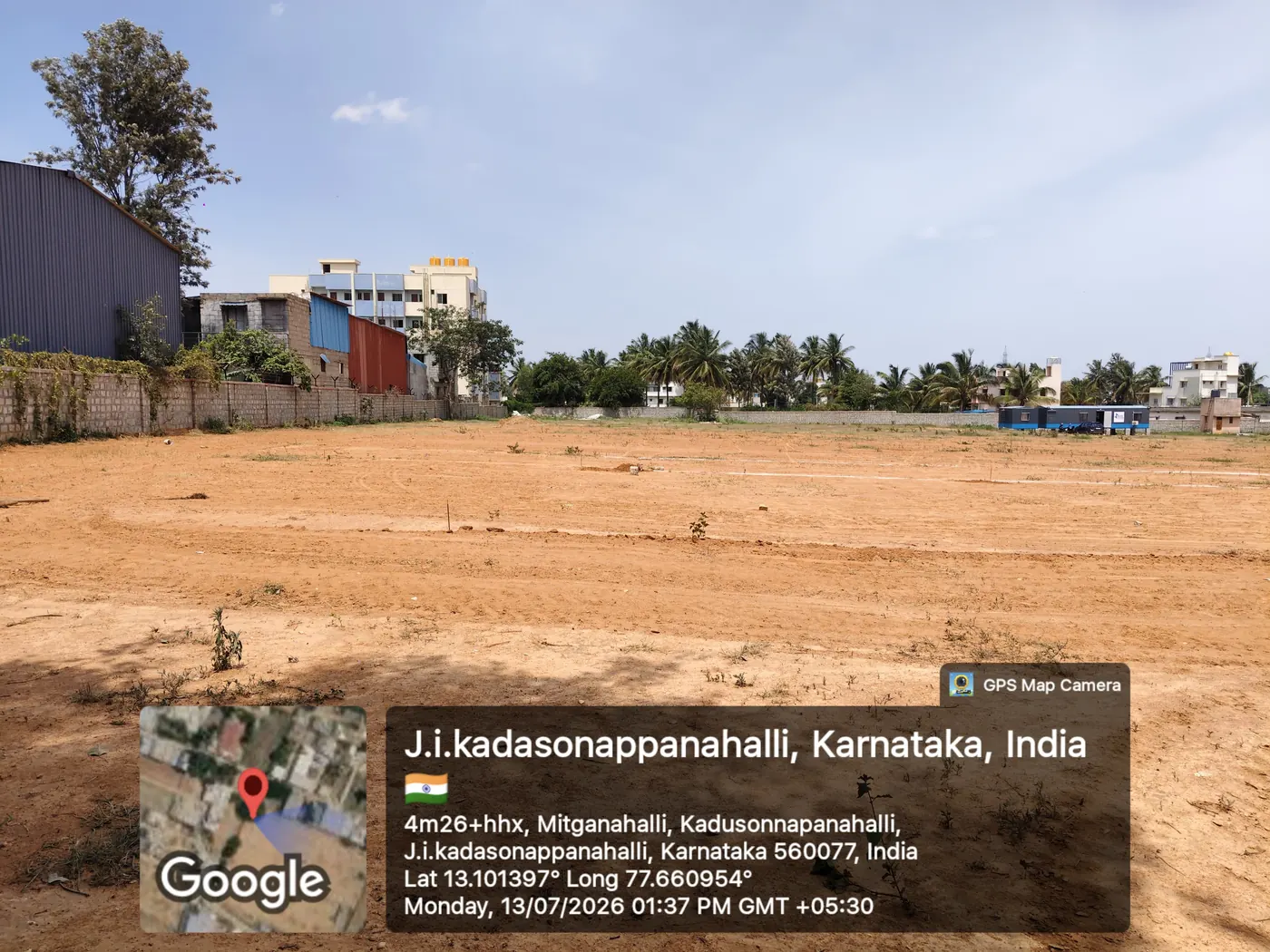 Completed brick compound wall along the boundary of the HPR Shades of Green 83-villa site, Kadusoppanahalli